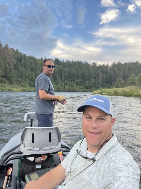 Guide and angler fishing from a drift boat